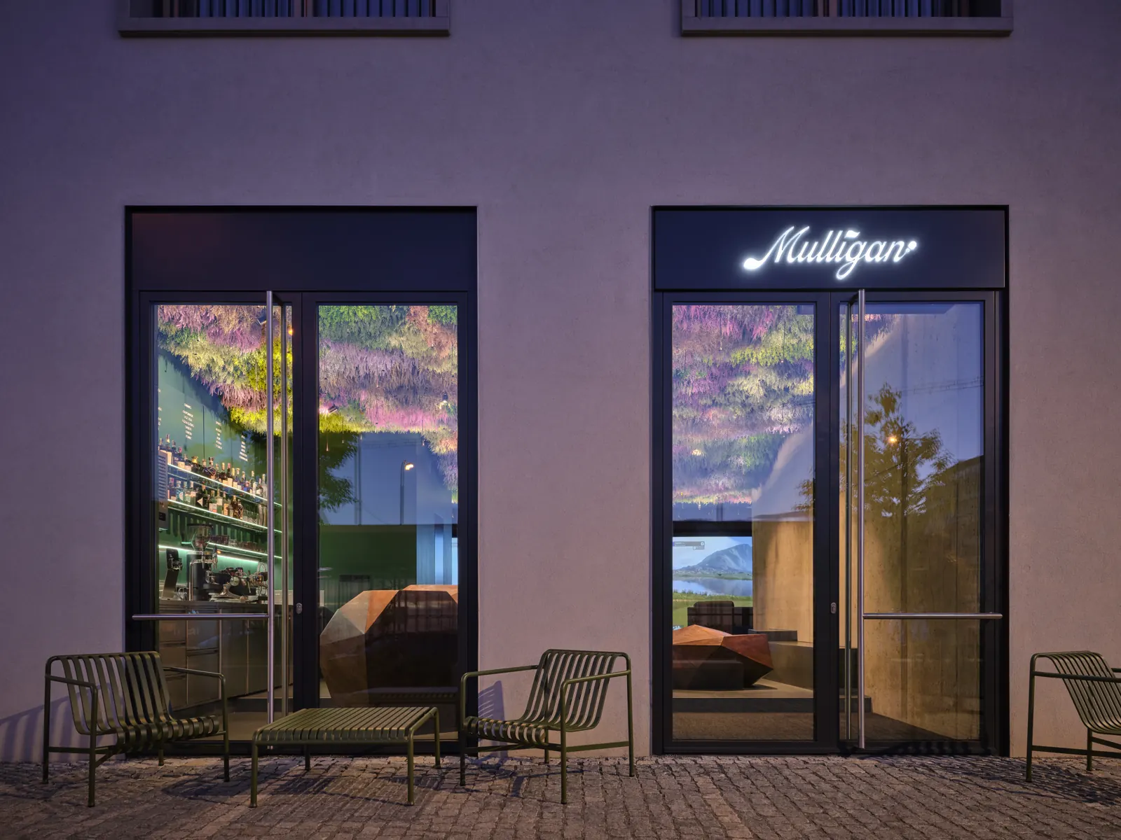 The Mulligan entrance in Smíchov at dusk