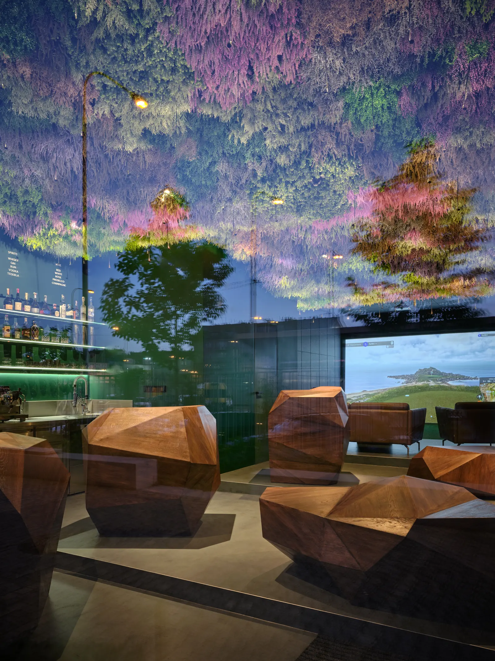 Mulligan at dusk – the terrace and the lit interior